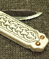 Copy of a double bladed folding bone handled knife. Size: approx. 120mm diameter